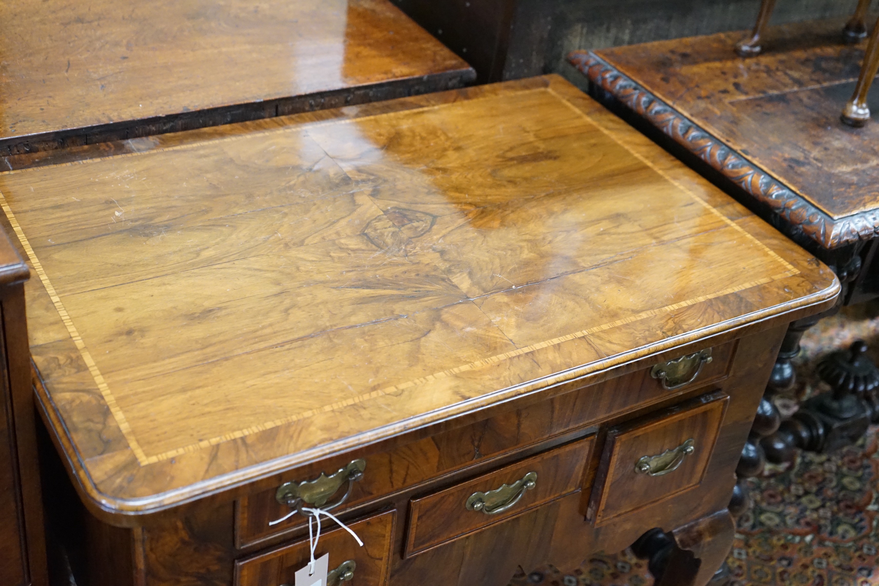 An 18th century banded walnut lowboy, width 75cm, depth 50cm, height 72cm